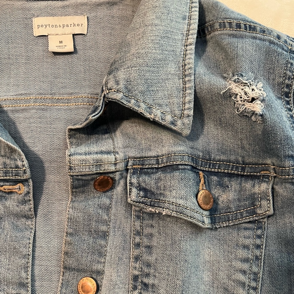 Distressed jean jacket